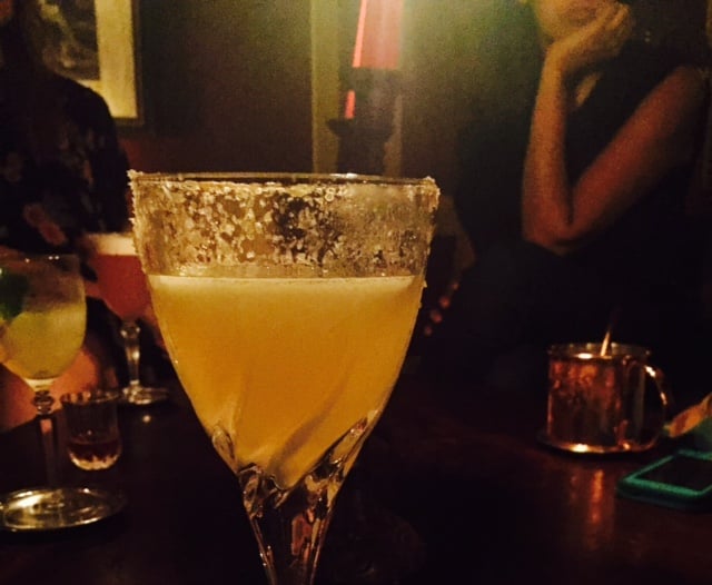 Sipping cocktails in a secret bar